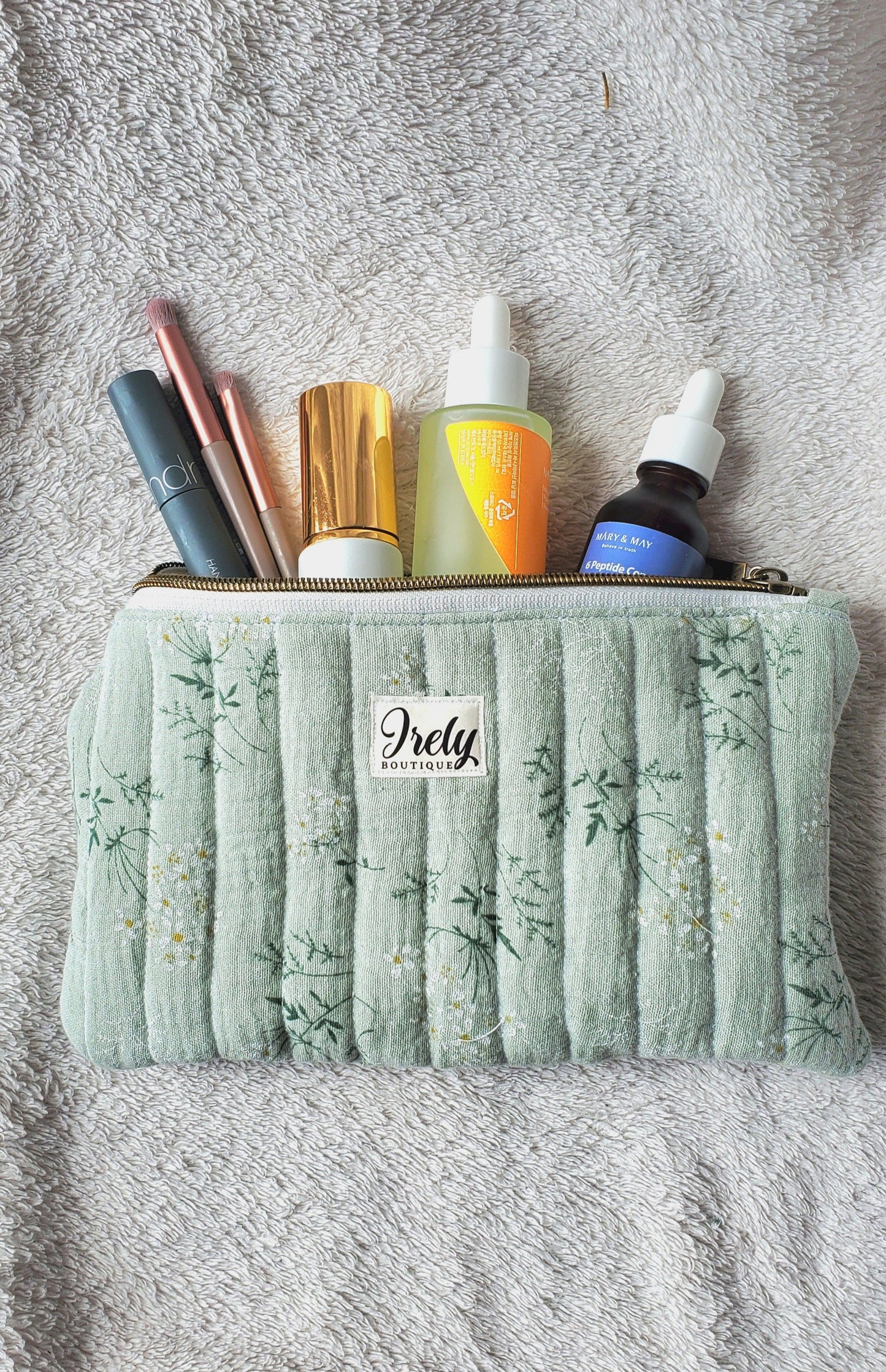 White Flowers on Green Pouch