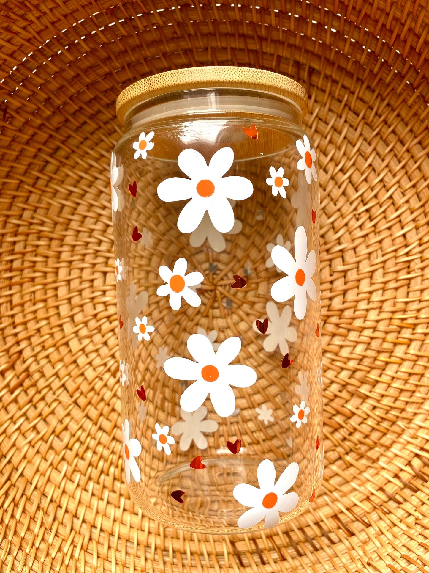 A cute and simple design with daisys and shiny hearts.