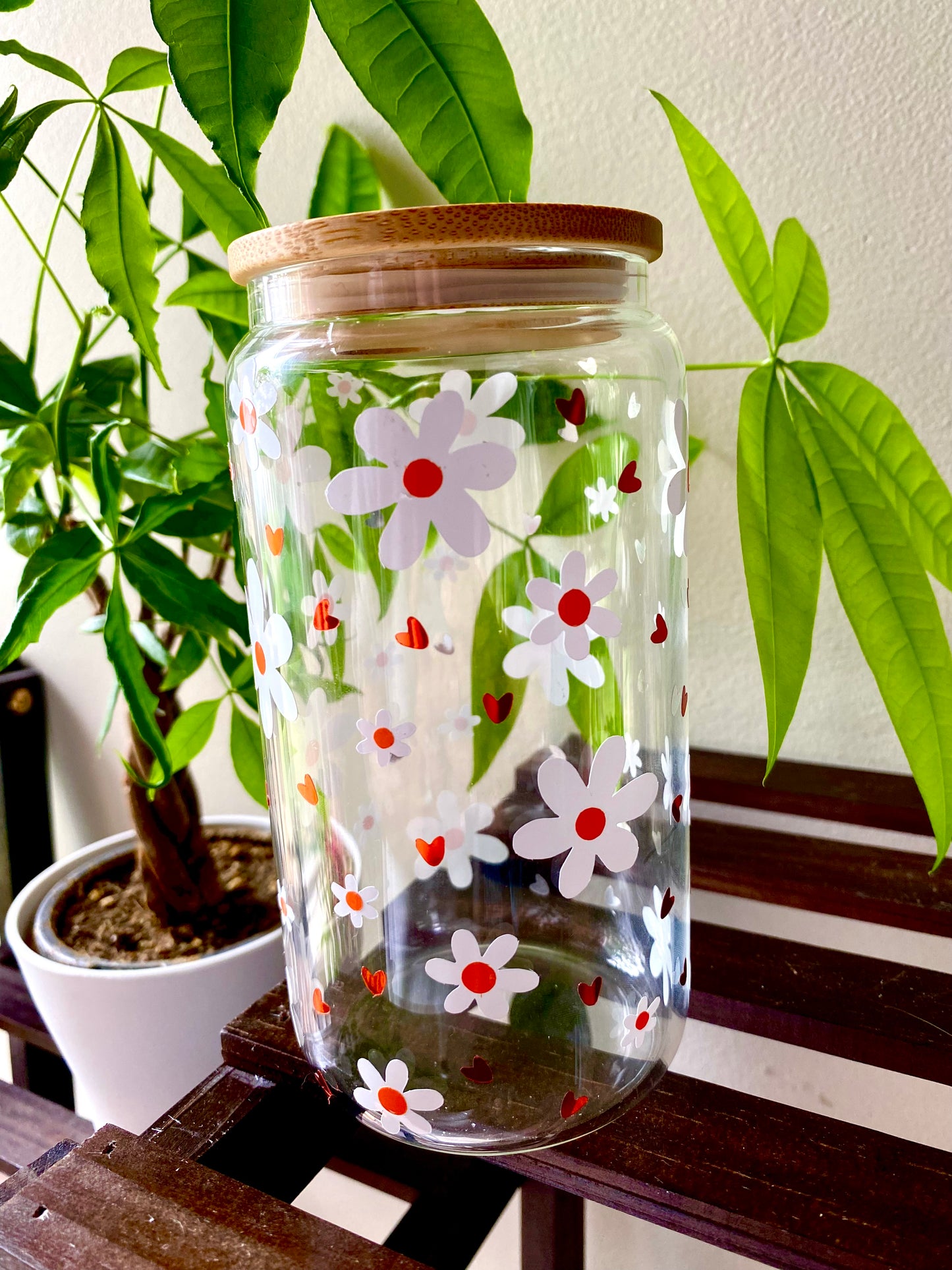 A cute and simple design with daisys and shiny hearts.