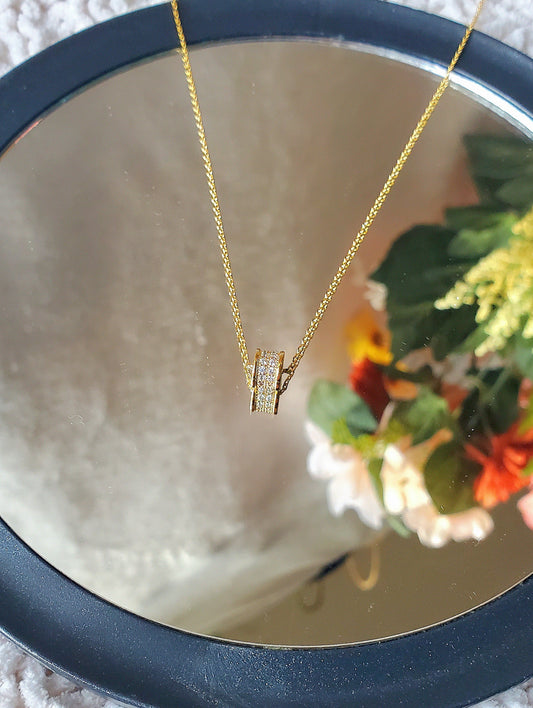 gold necklace with pave crystals.
