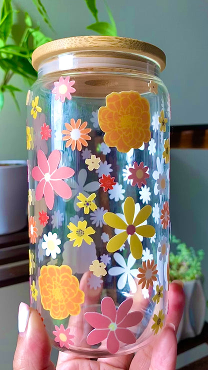 Color autumn flowers cover this 160z glass cup.